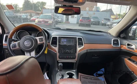 2013 Jeep Grand Cherokee Overland z USA, uszkodzony, nr VIN 1C4RJFCG1DC519661